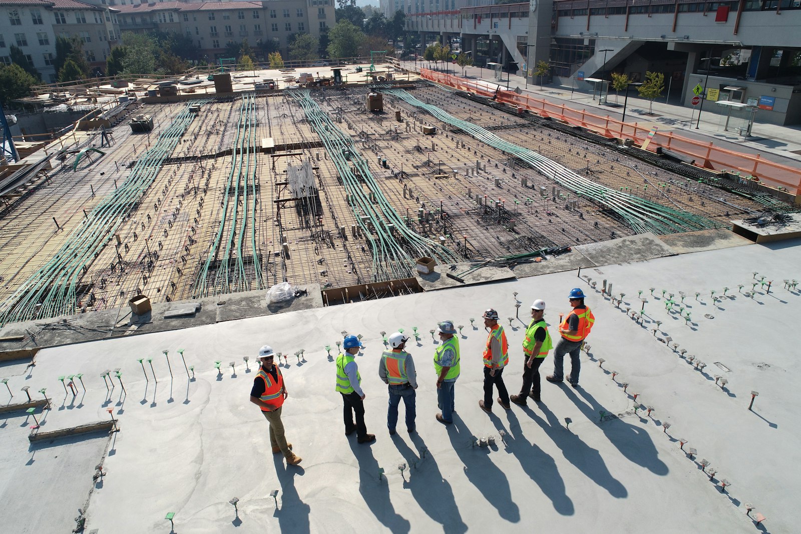 Engineers reviewing a slab under construction